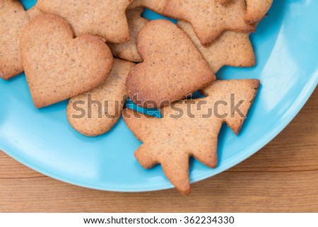 Tasty homemade cookies on blue plate