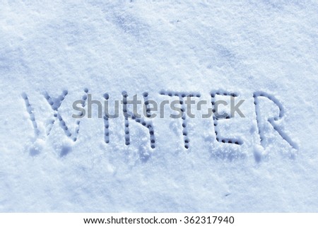 Written words, Winter on a snow field. Coolest Deep Blue filter applied.