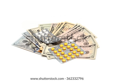 paper dollar bills and pills as the cost of treatment