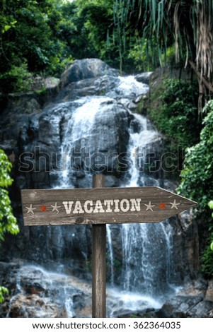 Direction holiday. Sign indicating the direction and in the background a tropical climate.