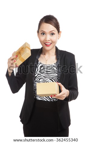 Young Asian business woman open a golden gift box  isolated on white background