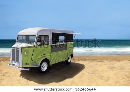Green retro fast food truck on the beach, horizontal template with copy space Royalty-Free Stock Photo #362466644