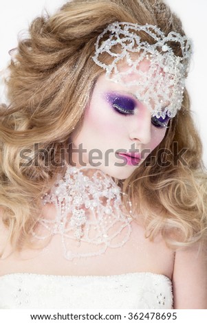 Beautiful woman portrait with pink lips. Snow queen