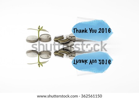 Close up plant sprouting from a group coins & noted of internet of things white background. business concept.(soft focus effect)