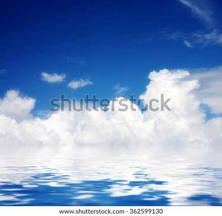 a beautiful clear sky and the water surface of the ocean
