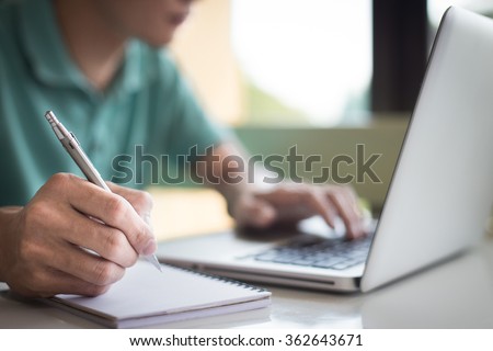 working on laptop, close up of hands of business man. Royalty-Free Stock Photo #362643671