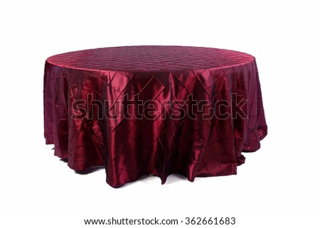 Tablecloth on table isolated on white background