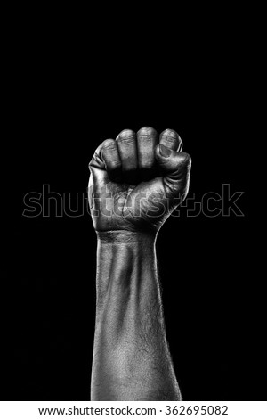 Black hand showing fist Royalty-Free Stock Photo #362695082