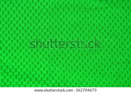 Texture of bright green cloth chess for background