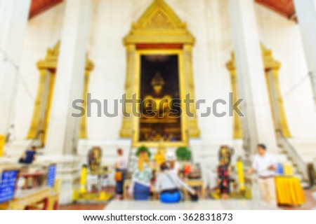 Abstract blurred background : People pray at temple.
