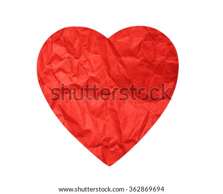 Crumpled paper heart on white background