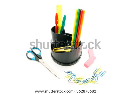 pens, pencils and other office stationery on white closeup