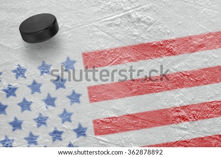 Hockey puck and a fragment of an image of the American flag