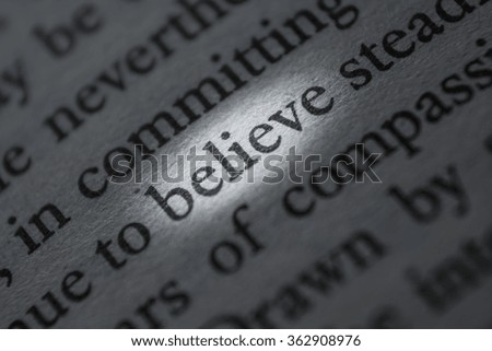 macro photograph of the word believe - concept