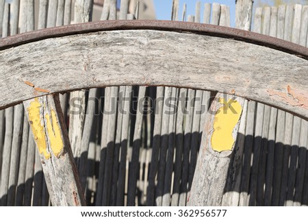 detail of old american wooden wagon wheel