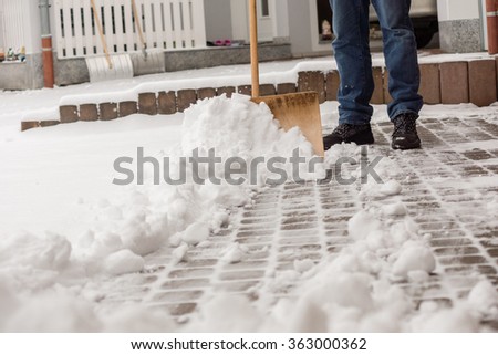 Cleaning the street from snow Royalty-Free Stock Photo #363000362