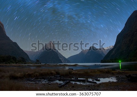 Milford sound at night with startrail, New Sealand