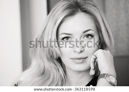 black and white portrait photograph of a beautiful blonde girl