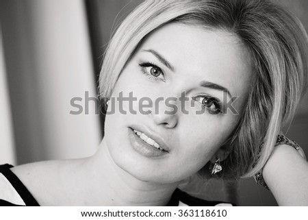 black and white portrait photograph of a beautiful blonde girl