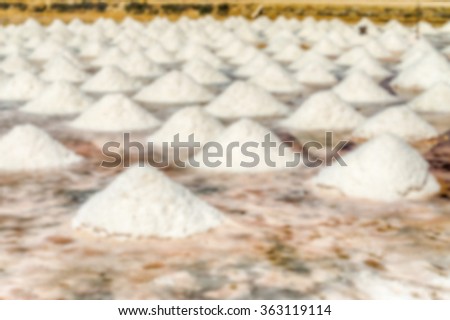 Defocused background with the salt flats of Trapani, Sicily, Italy. Intentionally blurred post production for bokeh effect
