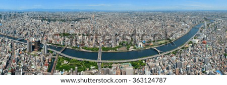 Tokyo urban skyline rooftop view with river, Japan.