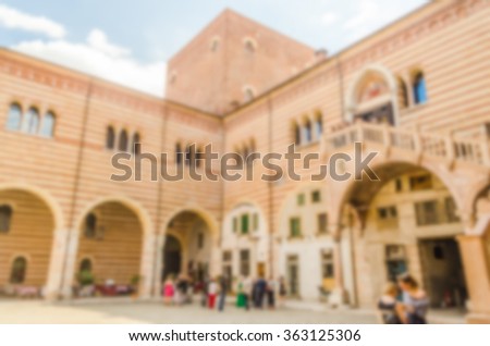 Defocused background with Palazzo del Mercato Vecchio, Verona, Italy. Intentionally blurred post production for bokeh effect