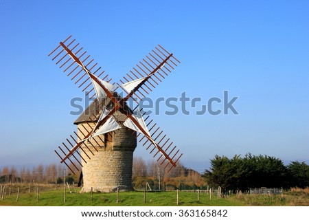 old windmill in france Royalty-Free Stock Photo #363165842