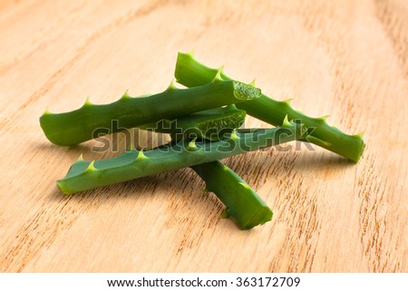fresh aloe vera  leaf on wooden background
