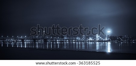 Night Skyline of Dnipropetrovsk with Reflection in the river Dnipro, Ukraine