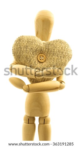 Macro view of wooden male person with knitted woolen heart with button isolated on white background
