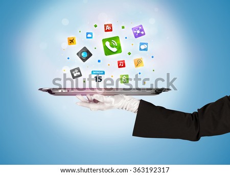 A stylish waiter hand with white gloves holding a silver plate full of social media communication icons and symbols in front of blue background