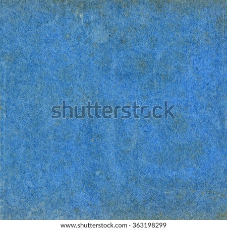 Blue paper texture useful as a vintage grunge background