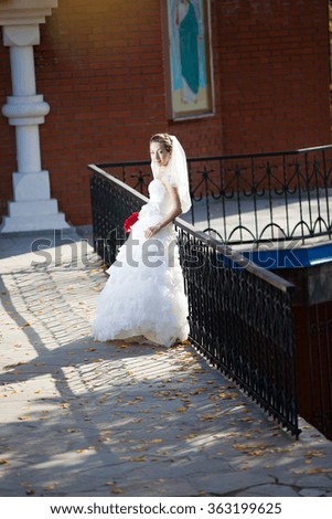 bride against the backdrop of historic sites
