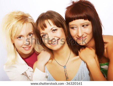three pretty happy teen girls