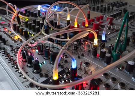 analog synthesizer - blinking lights on music equipment Royalty-Free Stock Photo #363219281