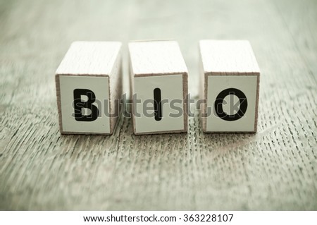 concept word forming with cube on wooden desk background - Bio
