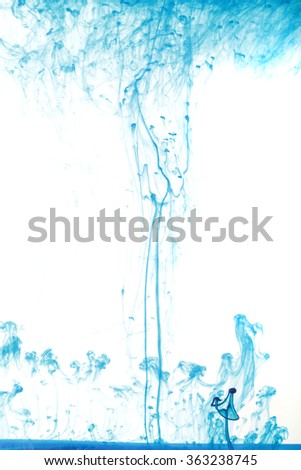 Abstract image of blue ink in water.
