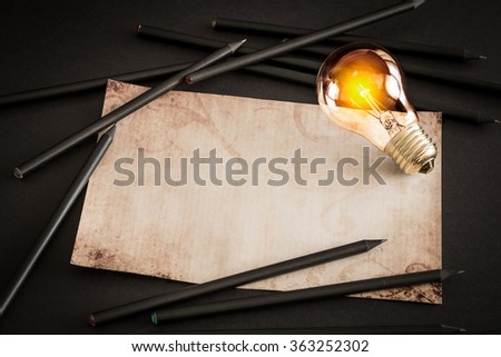 Bulb Light Idea Pencils Paper - Stock Image