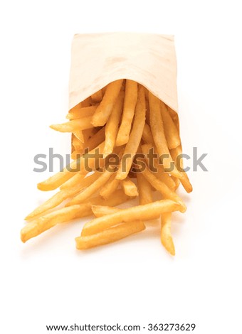 Golden French fries potatoes on white