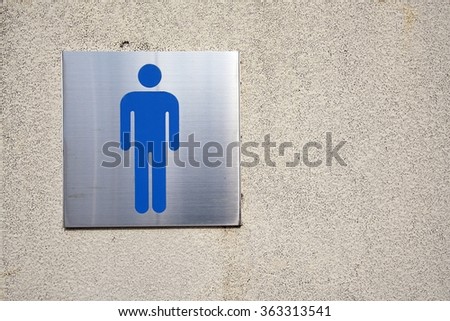 Toilet Sign, Toilet icon for Men - steel label on rock surface (Toilet icon great for any use)