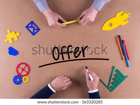 Business Team with a single word Offer