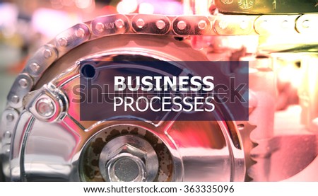 BUSINESS PROCESSES on the Mechanism of Metal Cogwheels background , color filter image , innovation concept , business concept, business idea