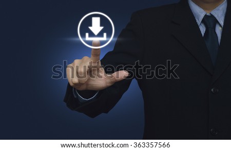 Businessman hand pushing button web download icon over blue background Royalty-Free Stock Photo #363357566