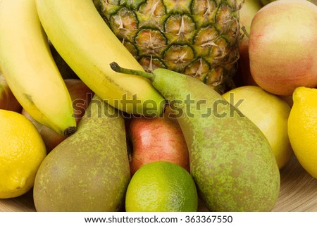 Pineapple and other fruit isolated on white backgroung