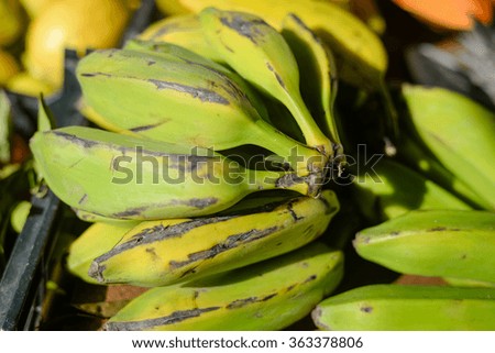 Bananas on a market background, closeup