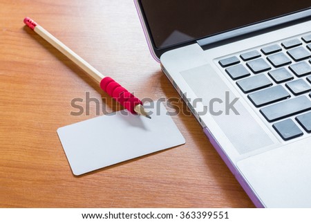 Simply freelance work table with laptop, stock photo