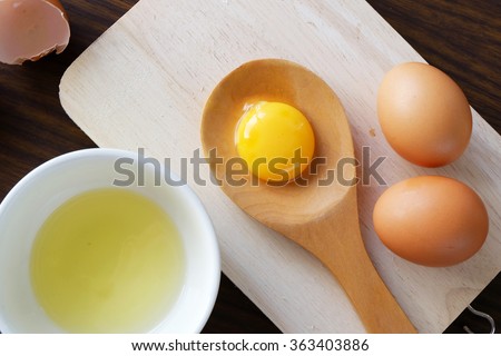  separated egg white and yolk Royalty-Free Stock Photo #363403886