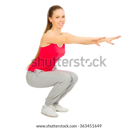 Sporty girl doing gymnastic exercises isolated