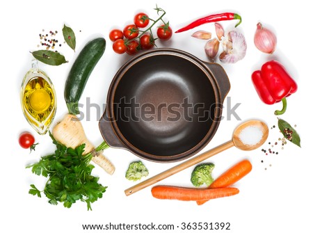  Top view of open pan, fresh raw vegetable and spices for soup isolated on white background Royalty-Free Stock Photo #363531392