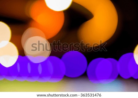 Abstract circular bokeh lighting in the night can be used for background and text input